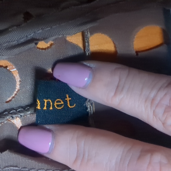 J. JANET* fun funky asymmetrical 'hole-y' vest in a neutral taupe colour - Picture 8 of 10